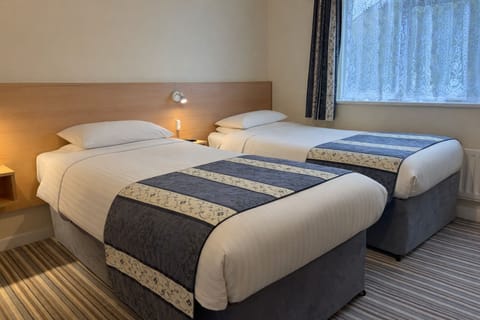 Standard Twin Room | Individually decorated, iron/ironing board, free WiFi, bed sheets