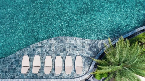 Grand Deluxe Pool View Room | 1 bedroom, in-room safe, desk, laptop workspace