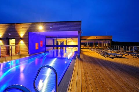 Indoor pool, outdoor pool, pool umbrellas, sun loungers