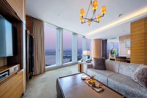 Premium bedding, down comforters, free minibar items, in-room safe