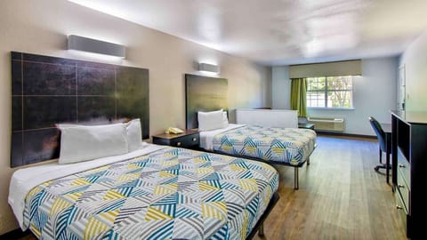 Desk, laptop workspace, free WiFi, bed sheets