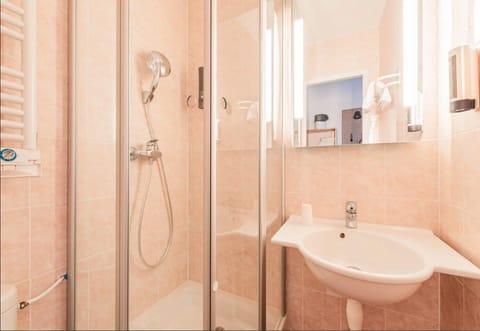 Shower, free toiletries, hair dryer, towels