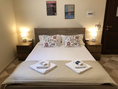 Economy Room, 1 King Bed (Basement) | Premium bedding, down comforters, memory foam beds, in-room safe