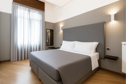 Deluxe Room, 1 Queen Bed, City View | 1 bedroom, premium bedding, minibar, in-room safe