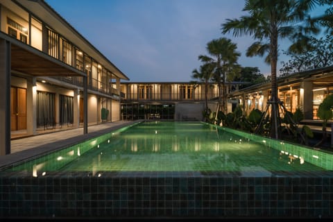 Outdoor pool, open 6:00 AM to 9:00 PM, sun loungers