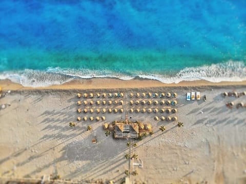 Private beach, sun loungers, beach umbrellas, beach bar