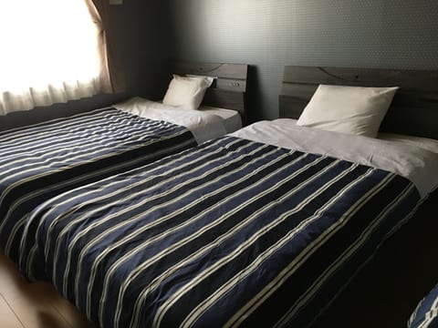 Deluxe Family Suite | Soundproofing, WiFi (free), bed sheets