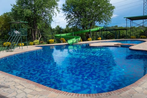 3 outdoor pools, pool umbrellas, sun loungers