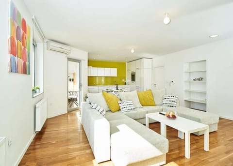 Apartment, 1 Bedroom, Sea View | Living room | Flat-screen TV