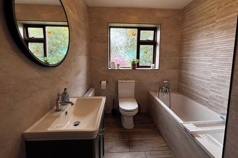 Separate tub and shower, deep soaking tub, hair dryer, towels