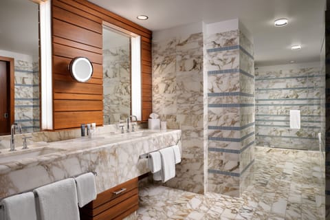 Combined shower/tub, designer toiletries, hair dryer, bathrobes