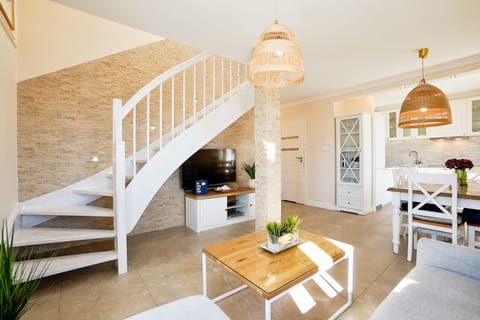 Deluxe Apartment, Multiple Beds, Partial Sea View | In-room safe, soundproofing, iron/ironing board, free WiFi