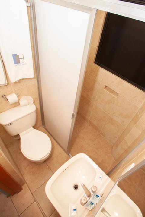 Shower, free toiletries, towels, soap