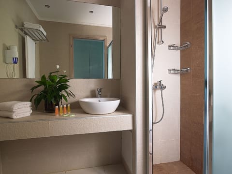 Superior Room, Garden View | Bathroom | Shower, hair dryer, towels, soap
