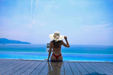 Outdoor pool, open 8:00 AM to 10:00 PM, pool umbrellas, sun loungers