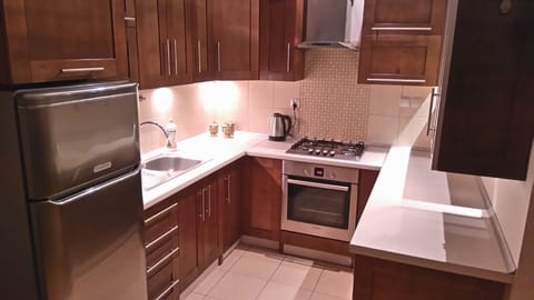 Comfort Apartment, Multiple Beds | Private kitchen | Oven, stovetop, electric kettle, cookware/dishes/utensils