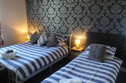 Triple Room | Individually decorated, individually furnished, iron/ironing board