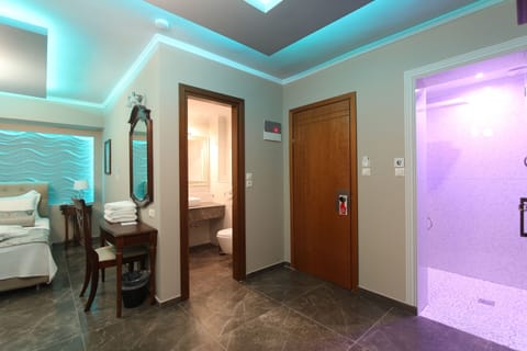 Junior Suite, Balcony | Minibar, in-room safe, desk, laptop workspace