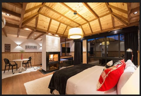 Deluxe Chalet, 1 Queen Bed | Egyptian cotton sheets, minibar, in-room safe, individually decorated