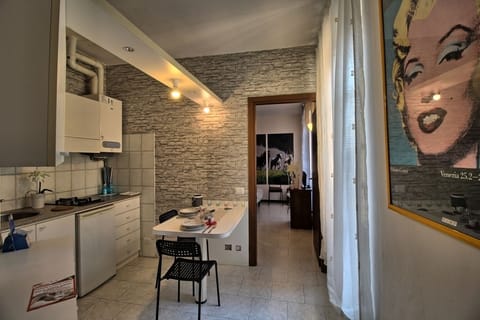 Studio, 1 Bedroom | Private kitchen | Full-size fridge, stovetop, cookware/dishes/utensils