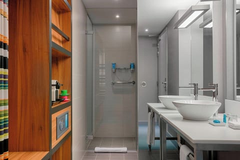 Shower, eco-friendly toiletries, hair dryer, towels