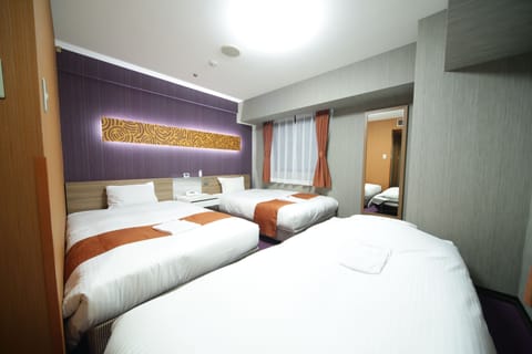Down comforters, desk, blackout drapes, iron/ironing board