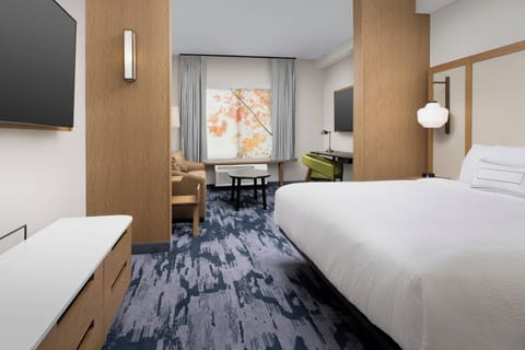 Desk, laptop workspace, blackout drapes, iron/ironing board