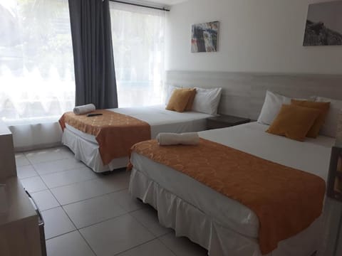 Family Double Room, 2 Double Beds | Minibar, blackout drapes, free WiFi, bed sheets