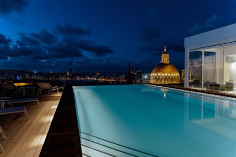 Outdoor pool, open 10:30 AM to 7:00 PM, sun loungers