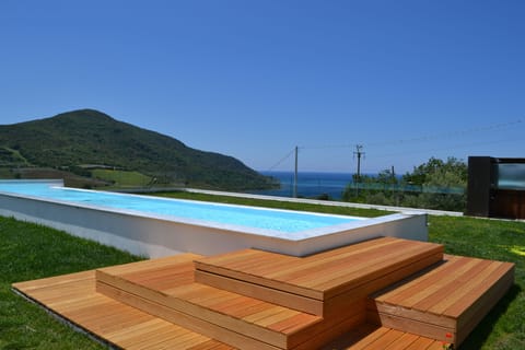 Seasonal outdoor pool, pool umbrellas, sun loungers