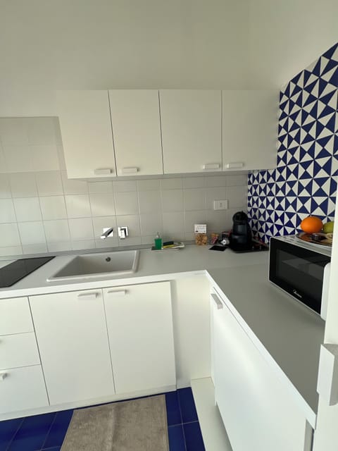 Fridge, microwave, stovetop, espresso maker