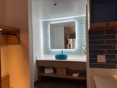 Suite, 2 Queen Beds, Non Smoking | Desk, laptop workspace, blackout drapes, iron/ironing board