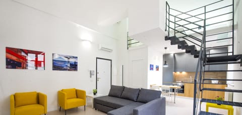Duplex | Living room | 30-inch TV with satellite channels