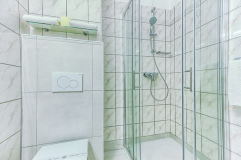 Shower, free toiletries, hair dryer, towels