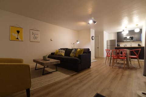 Signature Apartment, 1 King Bed with Sofa bed | Living room | Flat-screen TV