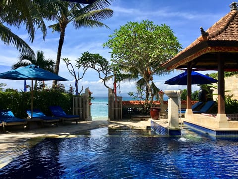 Outdoor pool, pool umbrellas, sun loungers
