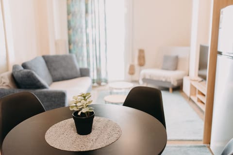 Panoramic Apartment, 1 Bedroom, Balcony, Marina View | Living area | Flat-screen TV