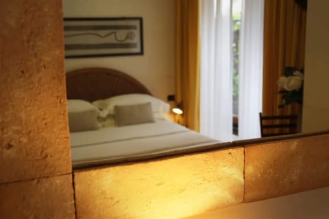 Premium bedding, down comforters, pillowtop beds, in-room safe