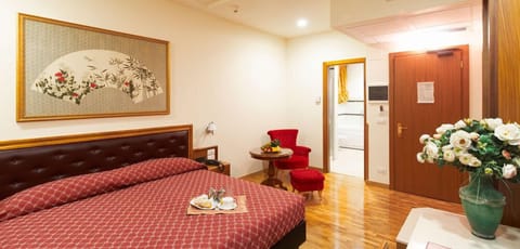 Superior Double Room | Minibar, desk, iron/ironing board, cribs/infant beds