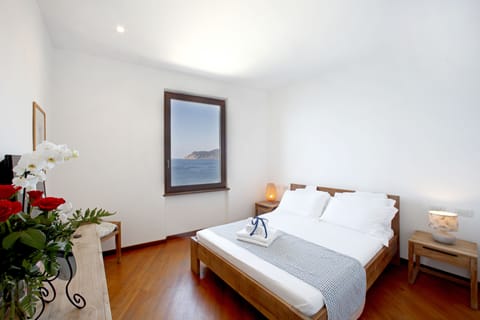 Superior Double Room, Sea View | Down comforters, memory foam beds, in-room safe, blackout drapes