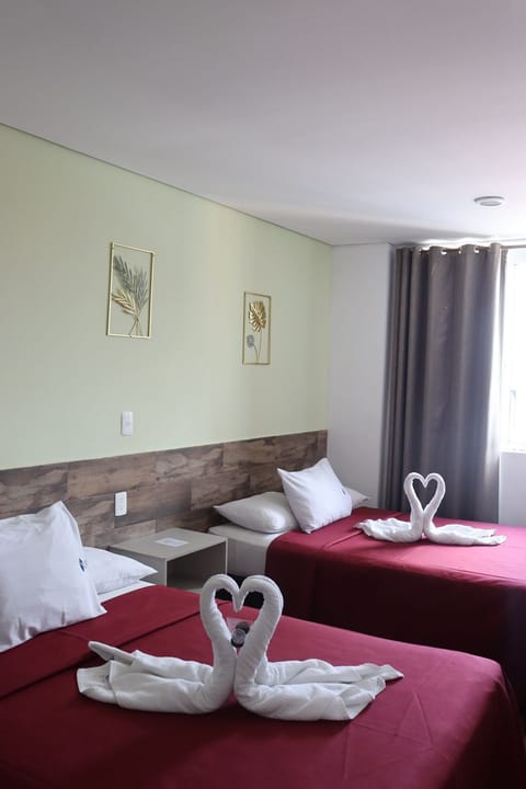 Family Room, 2 Double Beds | In-room safe, blackout drapes, iron/ironing board, free WiFi