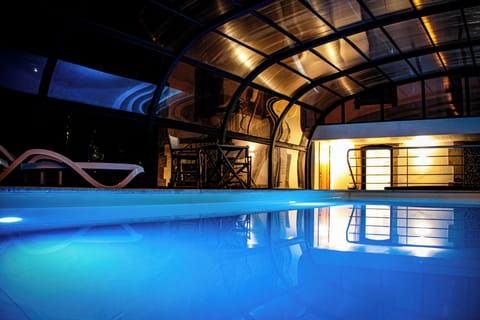 Indoor pool, open 9:00 AM to 8:00 PM, pool umbrellas, sun loungers