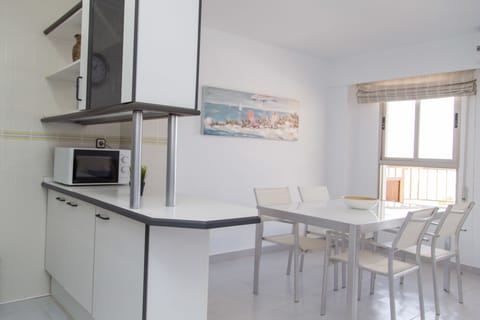 Apartment, 2 Bedrooms, Sea View | Private kitchen | Full-size fridge, microwave, oven, stovetop