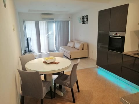 Apartment, 1 Bedroom, Sea View | Minibar, in-room safe, soundproofing, free WiFi