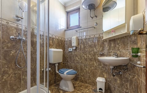 Hair dryer, bathrobes, bidet, towels