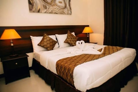 Matrimonial Room | Premium bedding, down comforters, blackout drapes, rollaway beds