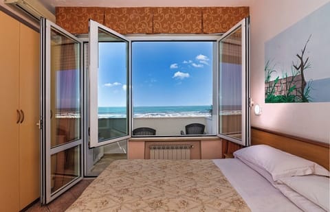 Double or Twin Room, Sea View | In-room safe, desk, free WiFi, bed sheets