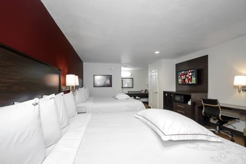 Premium Room, 2 Queen Beds (Upgraded Bedding & Snack, Smoke Free) | Desk, laptop workspace, blackout drapes, iron/ironing board