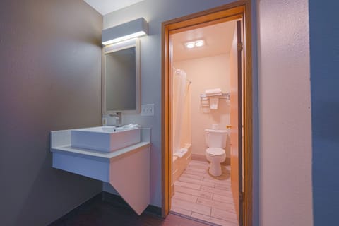 Premium Room, 2 Queen Beds, Kitchenette | Bathroom | Free toiletries, hair dryer, towels, soap