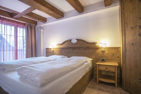 Family Apartment, 2 Bedrooms, 2 Bathrooms | In-room safe, desk, blackout drapes, free WiFi